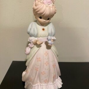 Charming Figurine with Floral Dress and Bird